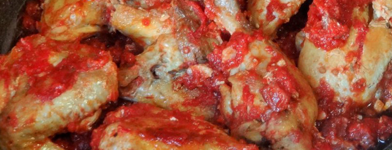 Pollo alla romana con pomodori e peperoni